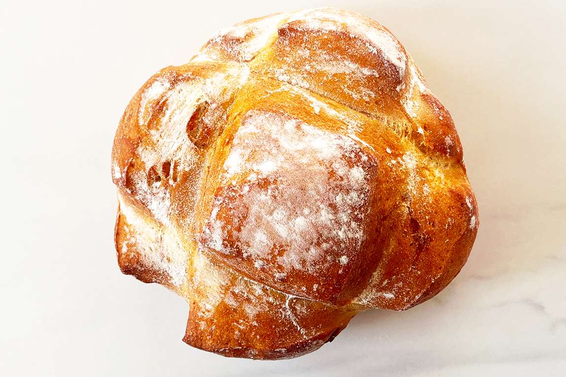 A loaf of bread on a light surface