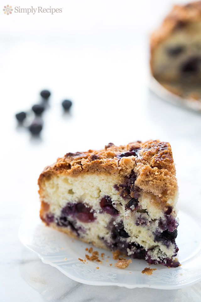 Slice of blueberry buckle cake on a plate