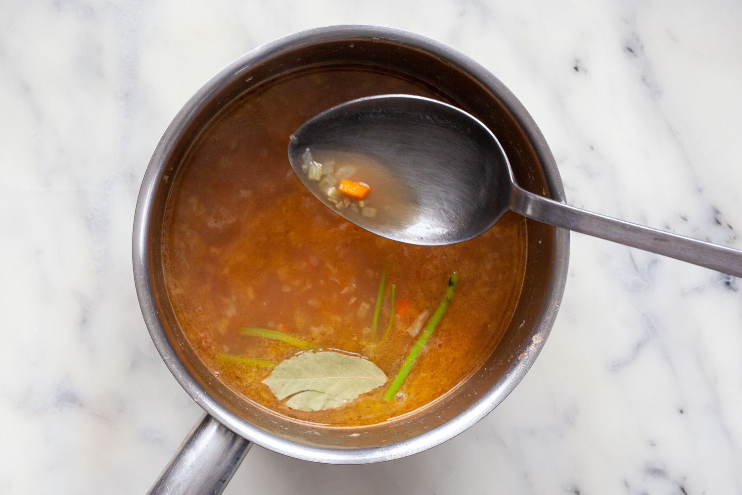 Add herbs to broth with onions, celery, and carrots for classic espagnole sauce