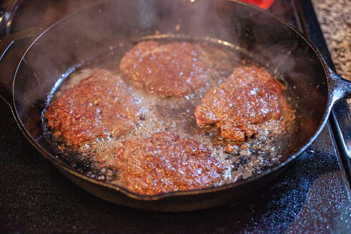How to Cook Burgers on the Stovetop flip the burgers