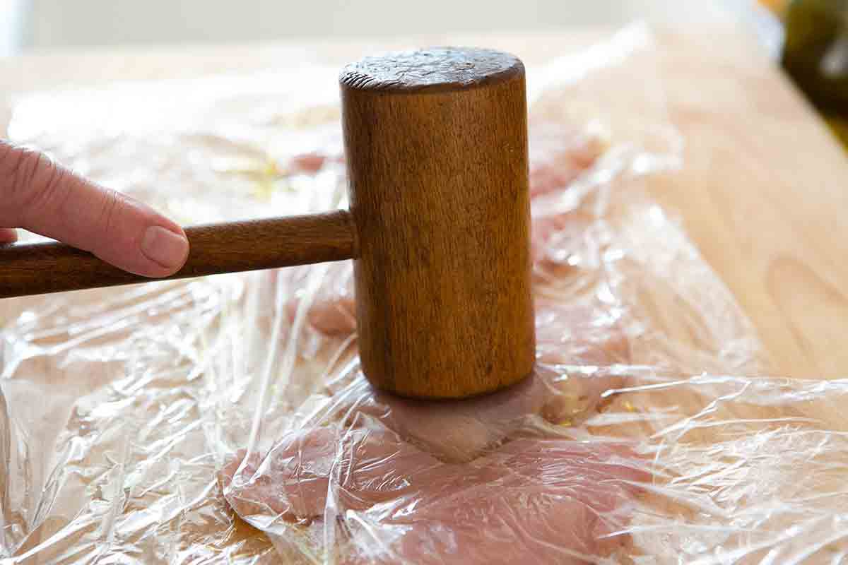 pounding chicken cutlets thin with mallet