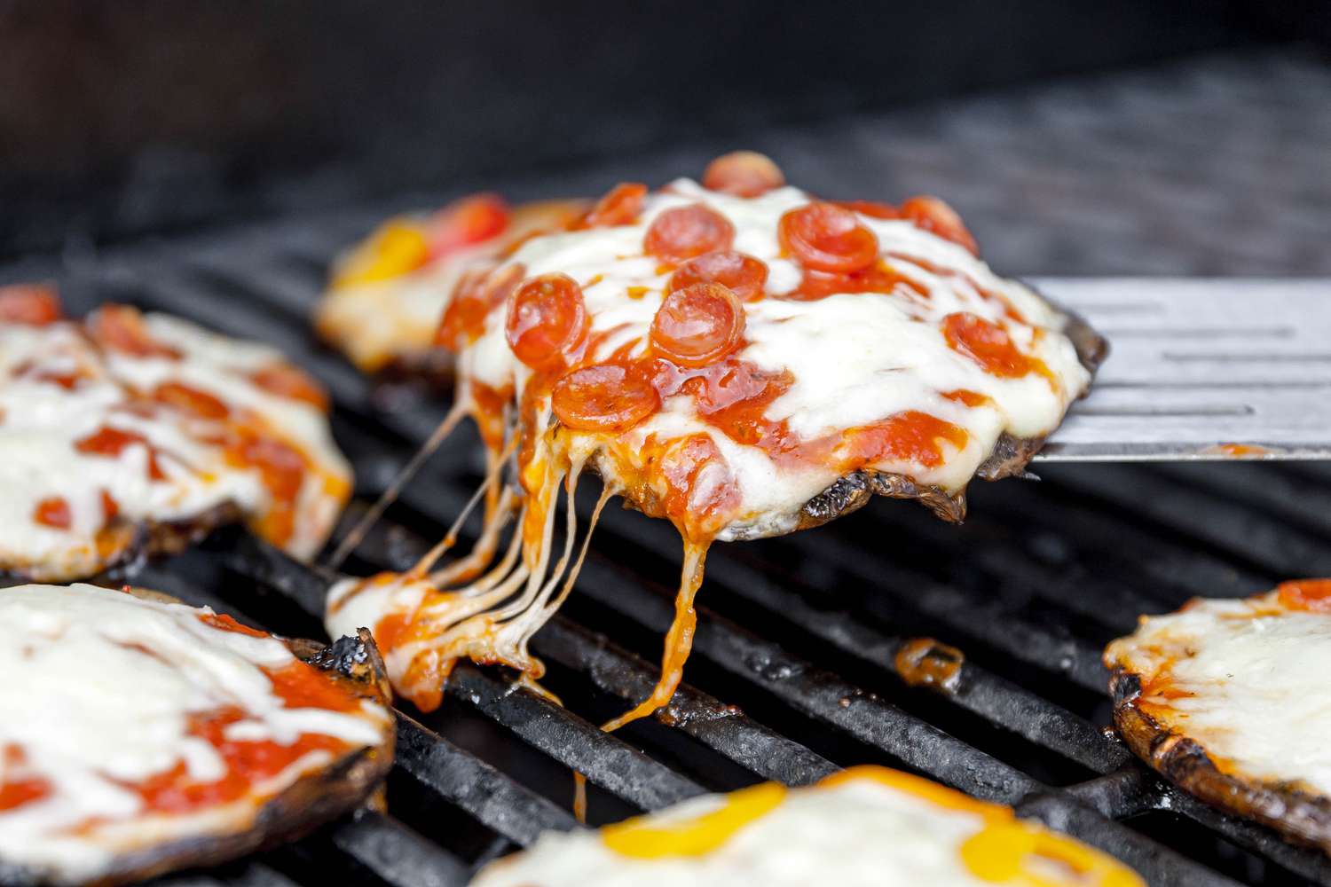 Spatula Used to Remove One of the Portobello Mushrooms From the Grill