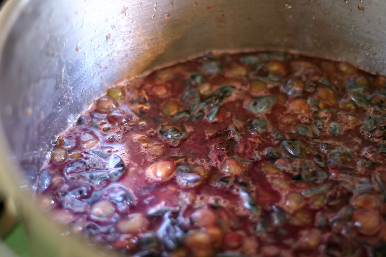 Making grape juice on the stove.