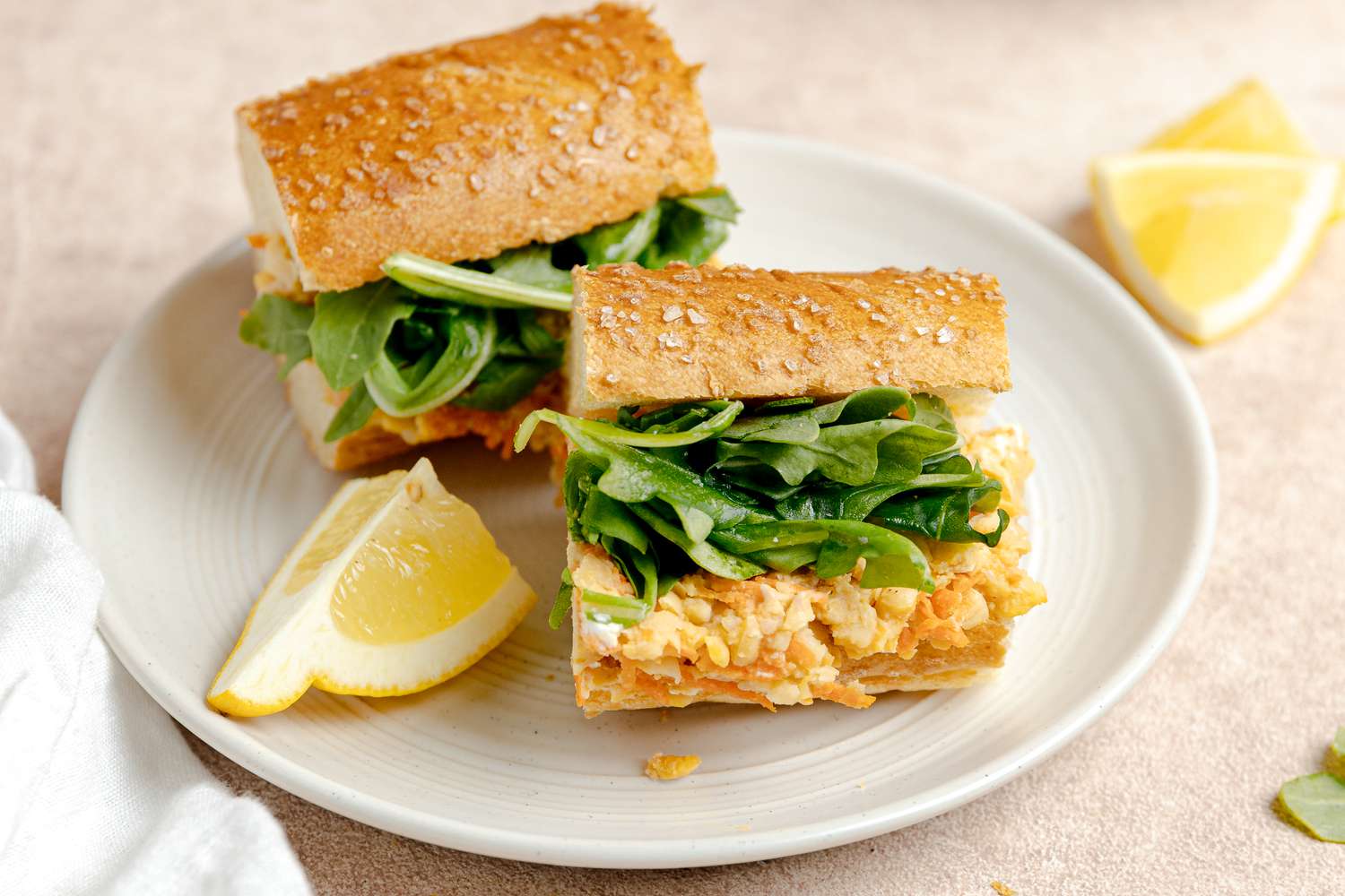 Chickpea Panini on a Plate with a Lemon Wedge
