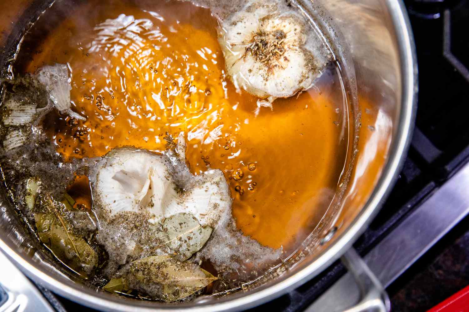 Overhead view of a pot with ingredients to make cherry wood smoked turkey breast.