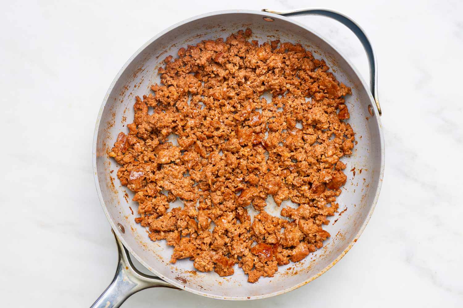 Chorizo meat cooked in a skillet for chorizo sloppy joe recipe