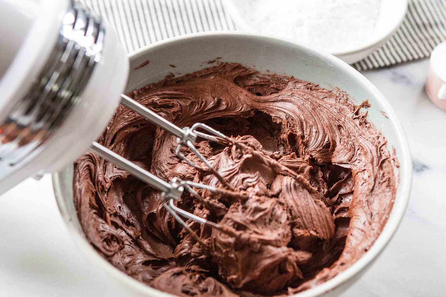 Vegan Chocolate Frosting Mixing in the powdered sugar
