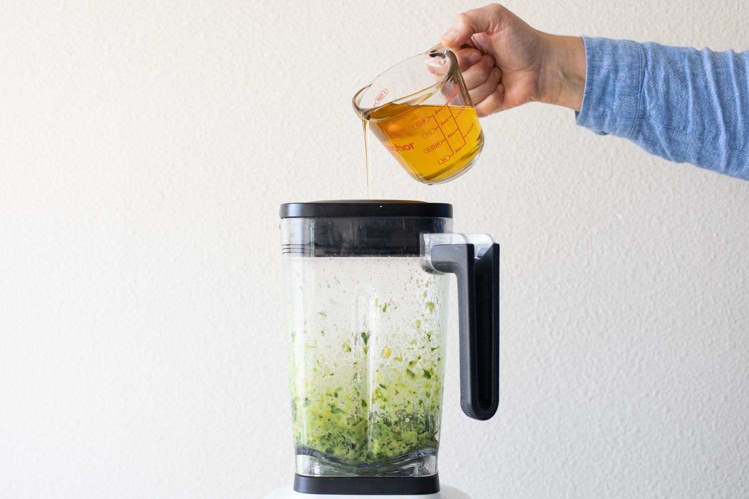 Avocado Oil Added to Blender for Avocado Lime Dressing