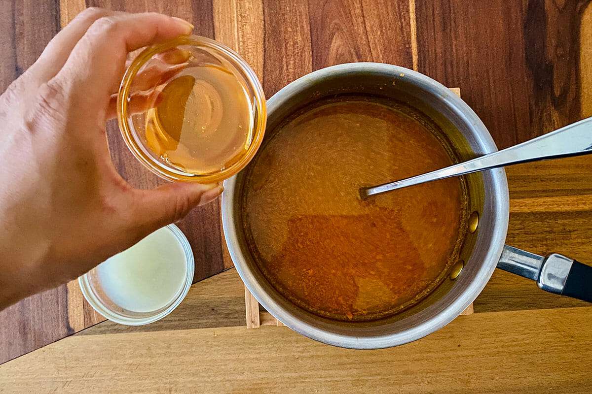 Ingredients added to a pot to make Turmeric and Ginger Elixir.