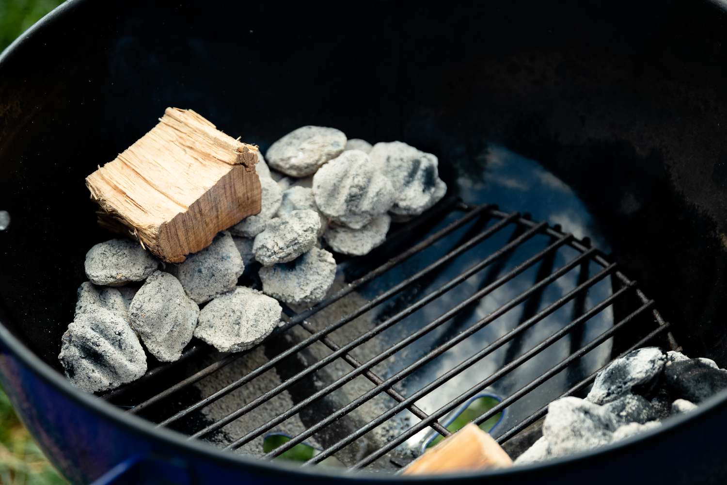 Wood and Charcoal in Grill for Smoked Whole Cauliflower with Spiced Soy Butter and Satay Sauce