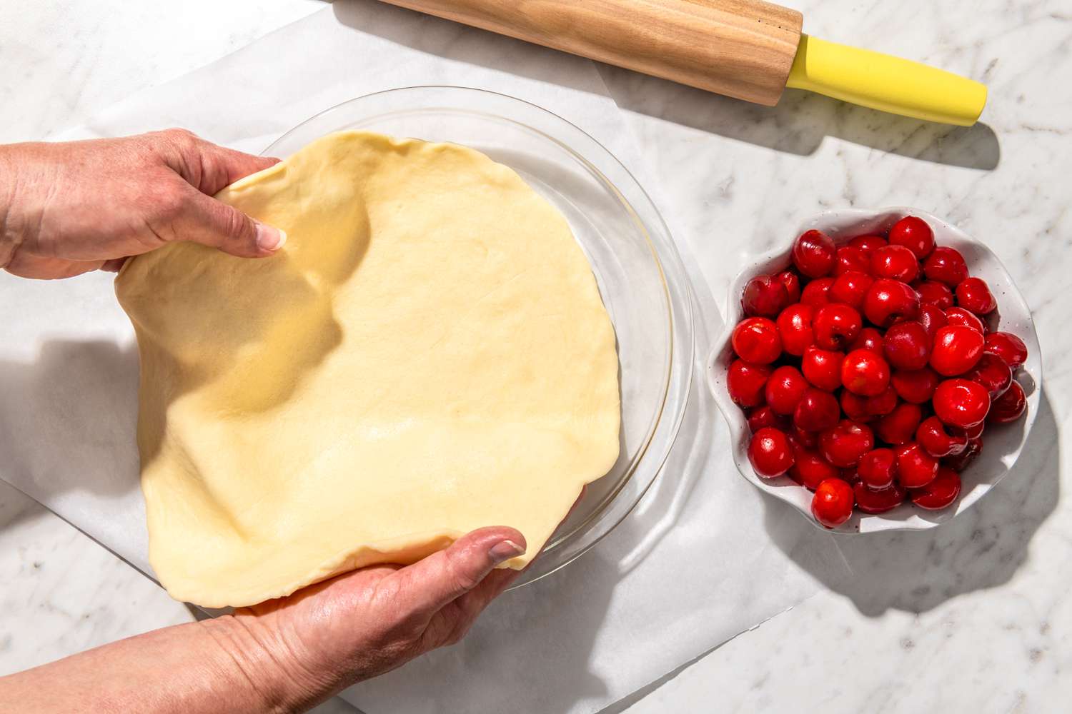 someone making cherry pie