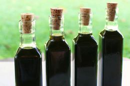 Four bottles of nocino