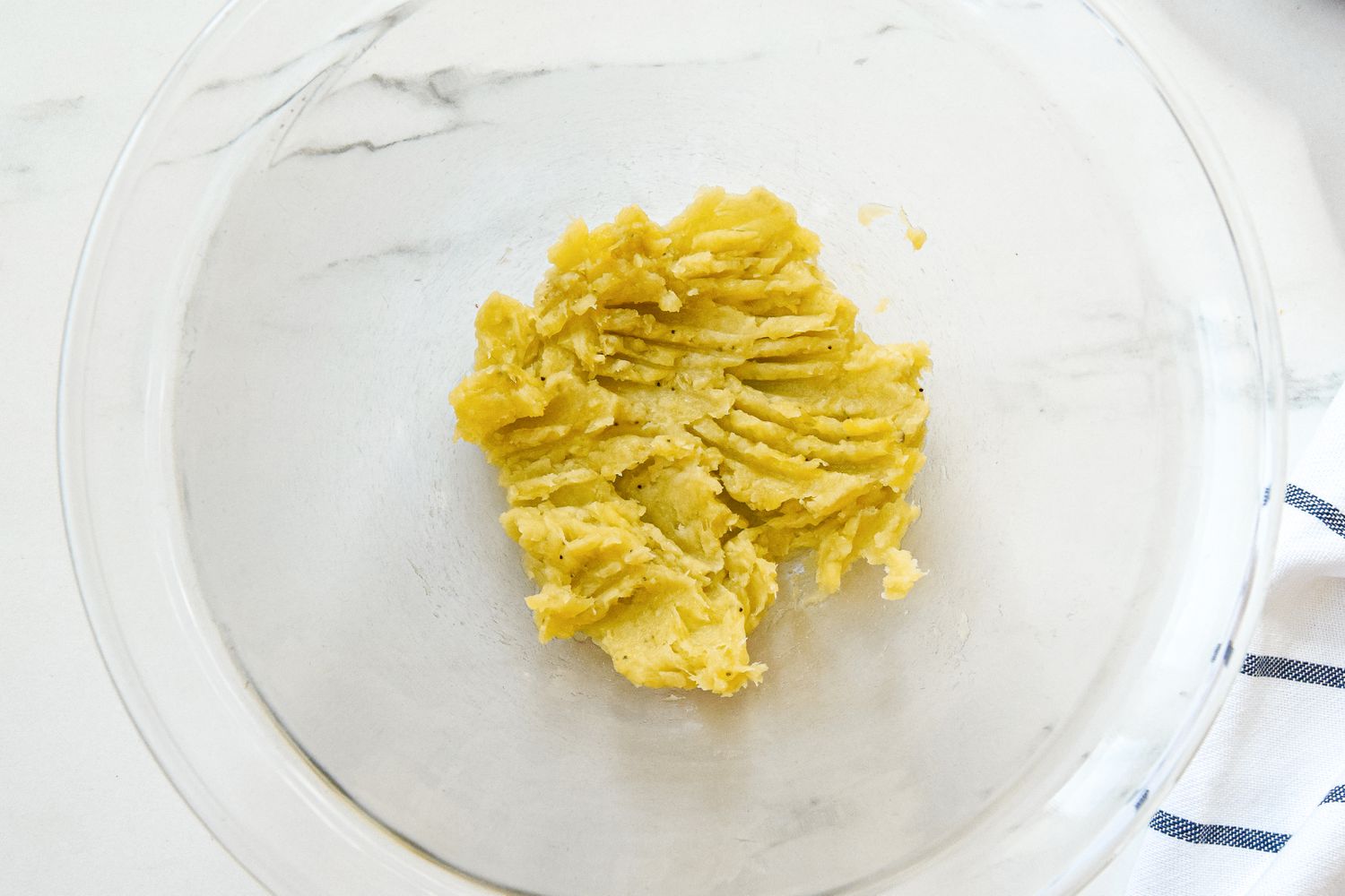 Mashed Overripened Bananas in a Bowl for Banana Oatmeal Cookies Recipe