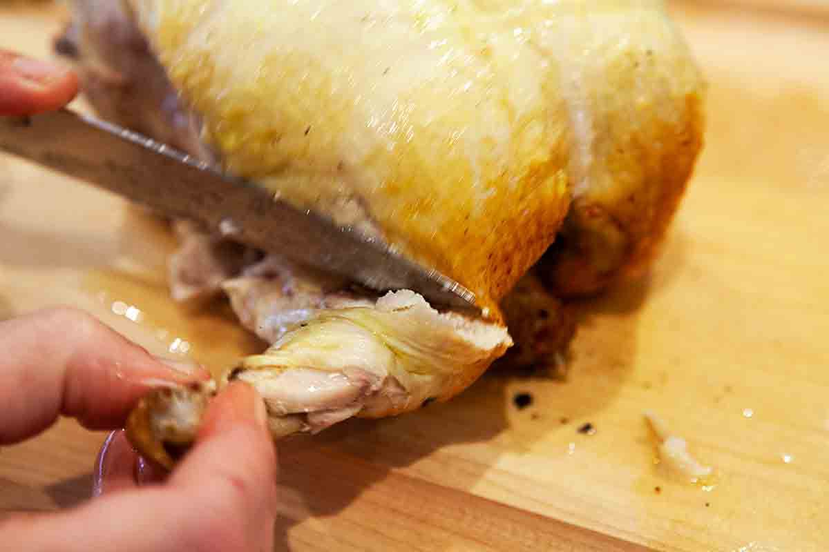 carve wings away from roast chicken with grapes