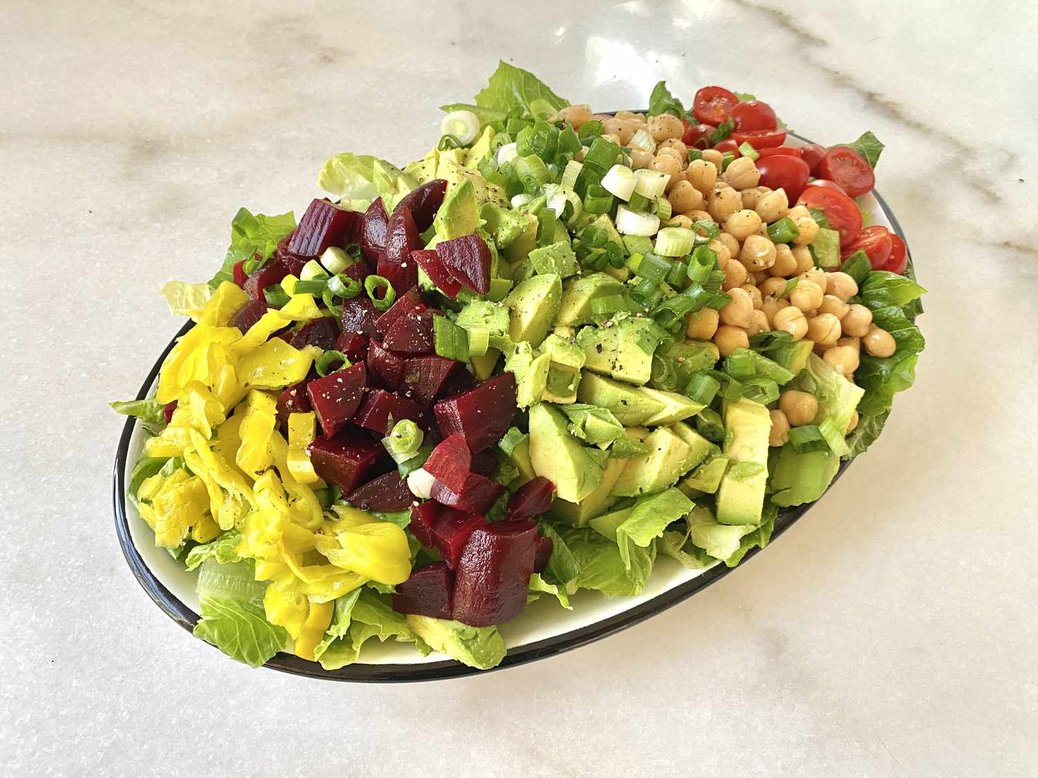 Gwyneth Paltrow's Really Good Chopped Salad chopped ingredients on a platter