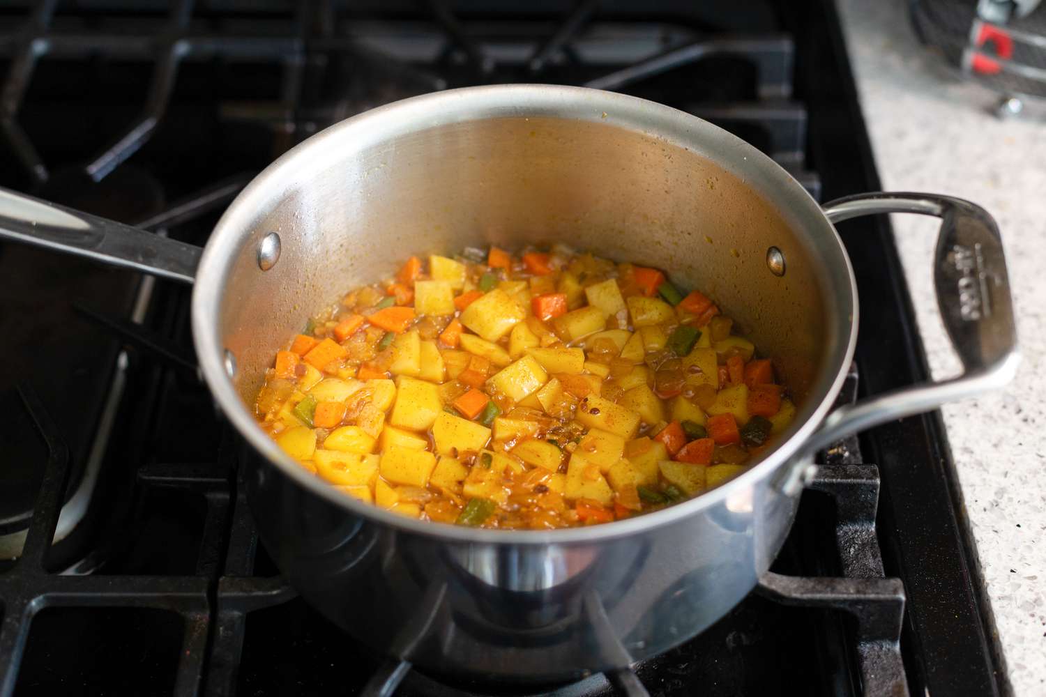 Cooking veggies for vegan queso recipe