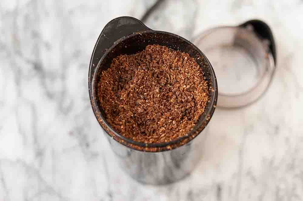 Coffee beans that have been ground in a grinder