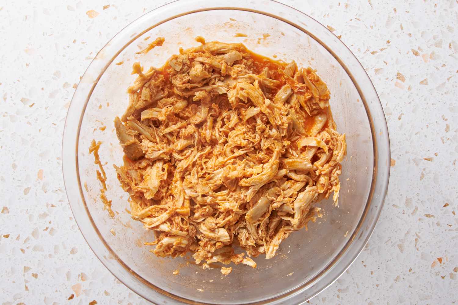 Shredded Chicken Mixed With the Buffalo Sauce Mixture for Buffalo Chicken Tacos Recipe