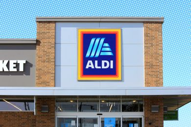 The storefront of an Aldi supermarket with a visible logo sign