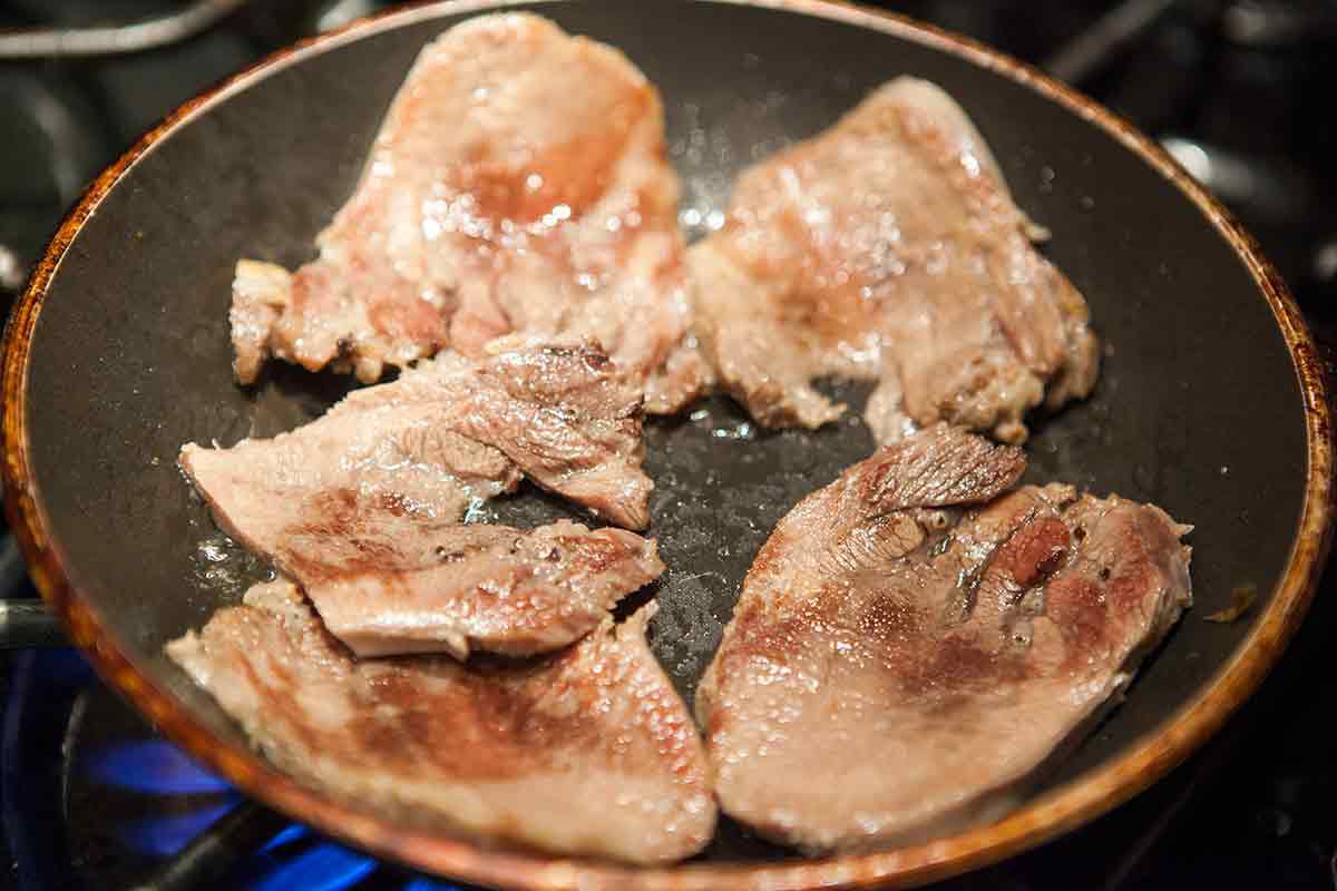 saute sliced beef tongue for tacos de lengua