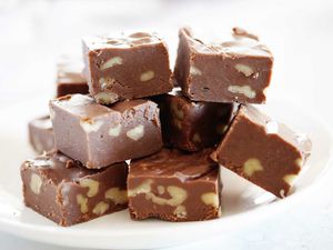 Easy fudge recipe cut into squares and stacked.