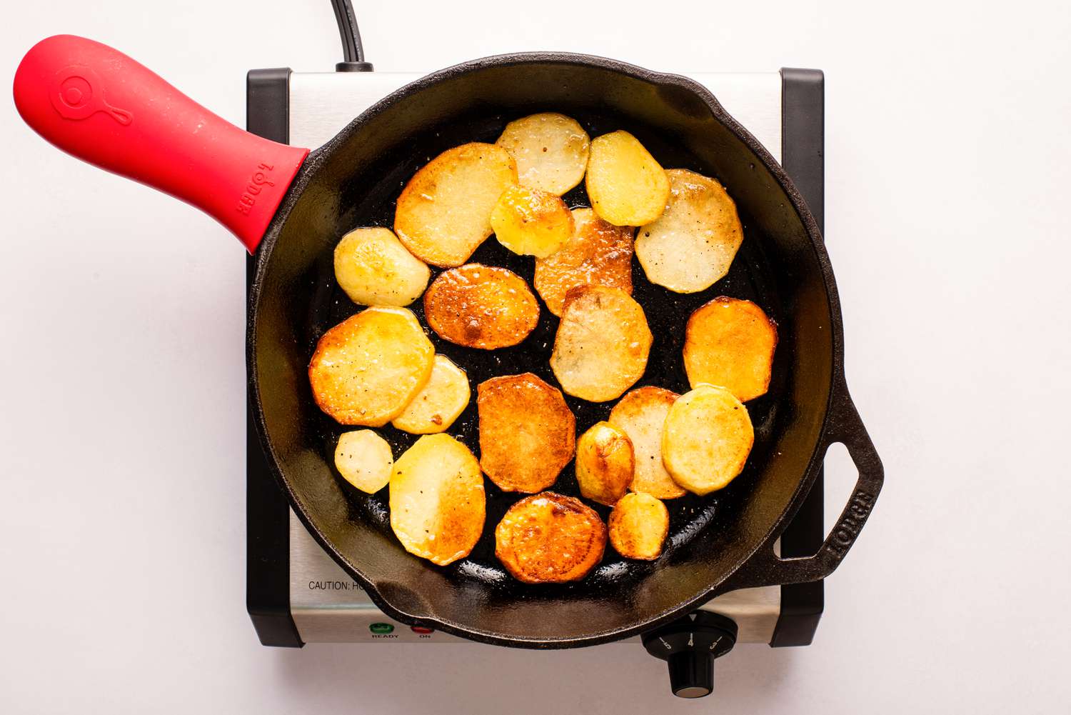 boiled potatoes pan fried in a cast iron skillet for Lyonnaise potatoes recipe