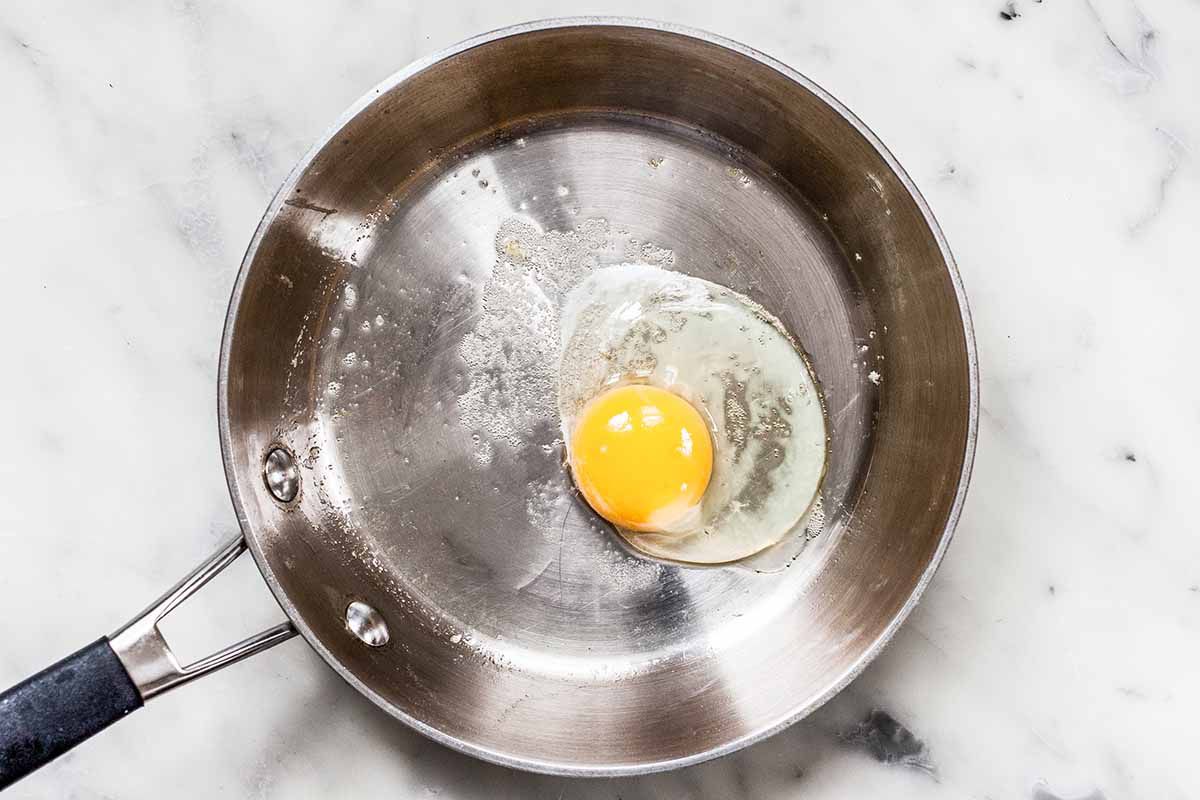 How to fry an egg using a skillet.