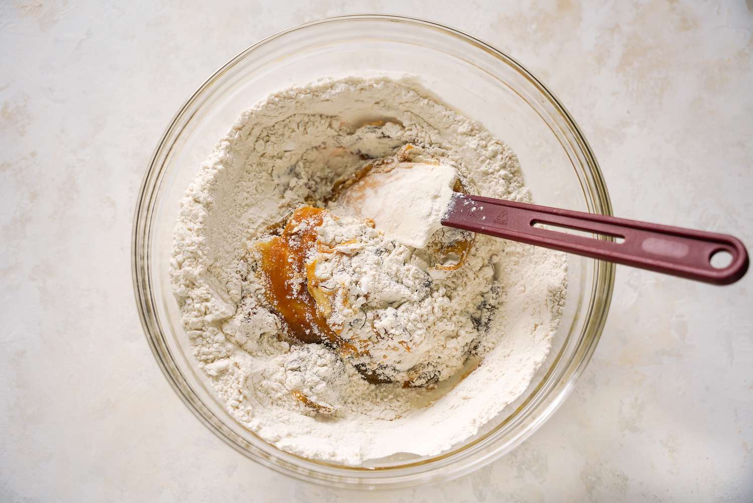Dry Ingredients Folded Into the Wet Ingredients Using a Spatula