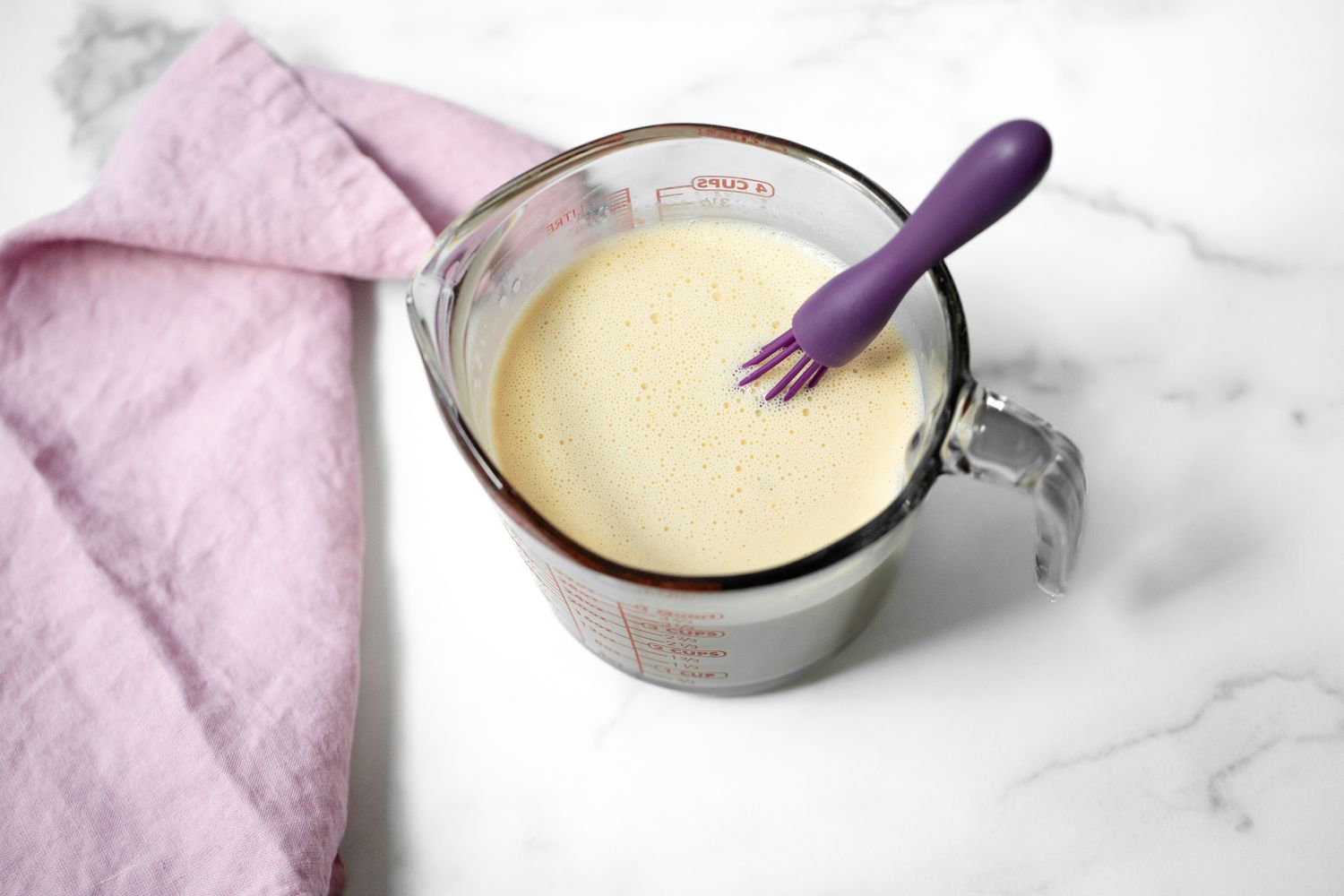 Whisked Egg and Milk Mixture for Macaroni Pie Trinidadian Recipe