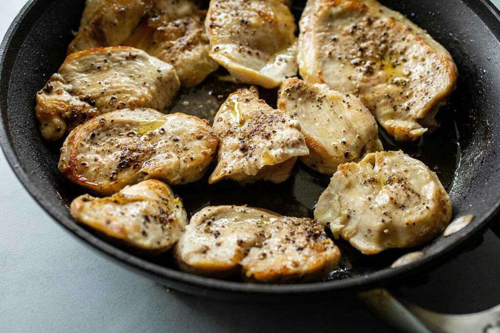 Cook chicken breast for one pot skillet chicken and rice