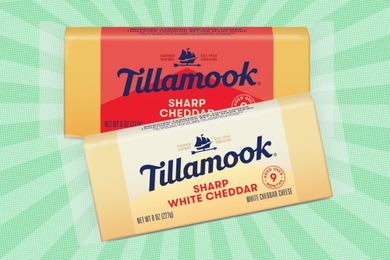 Tillamook sharp white cheddar and sharp cheddar in their packaging