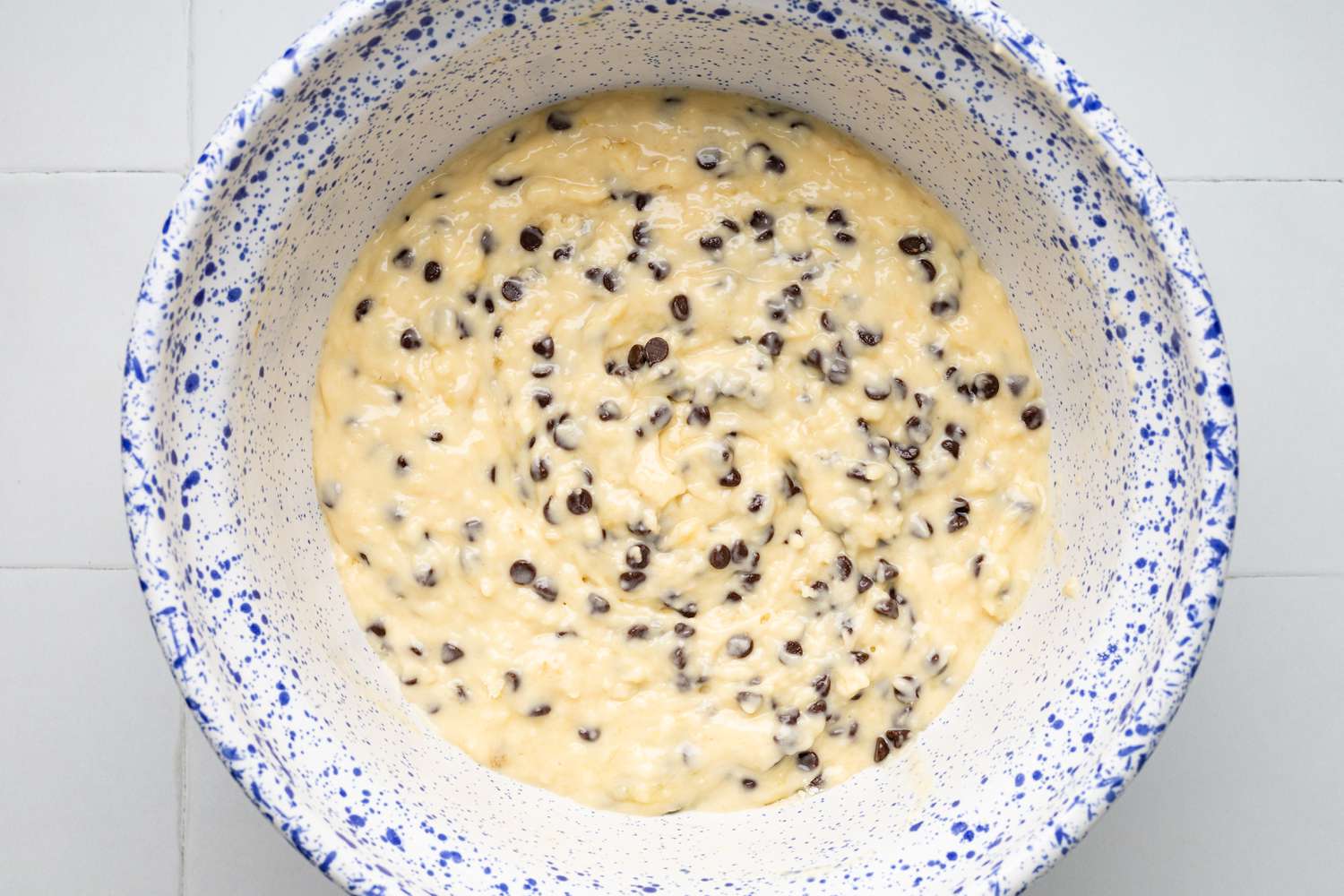 Chocolate Chips Added to Banana Chocolate Chip Muffins Batter 