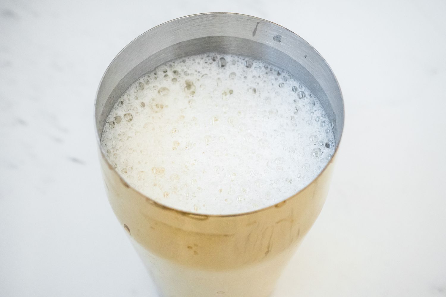 Amaretto Sour Froth in Cocktail Shaker 