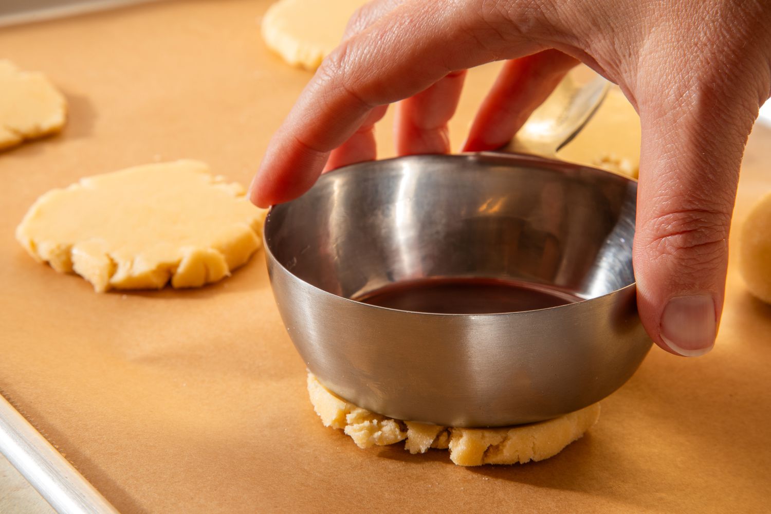 Smash sugar cookie dough ball smashed using the bottom of a bowl