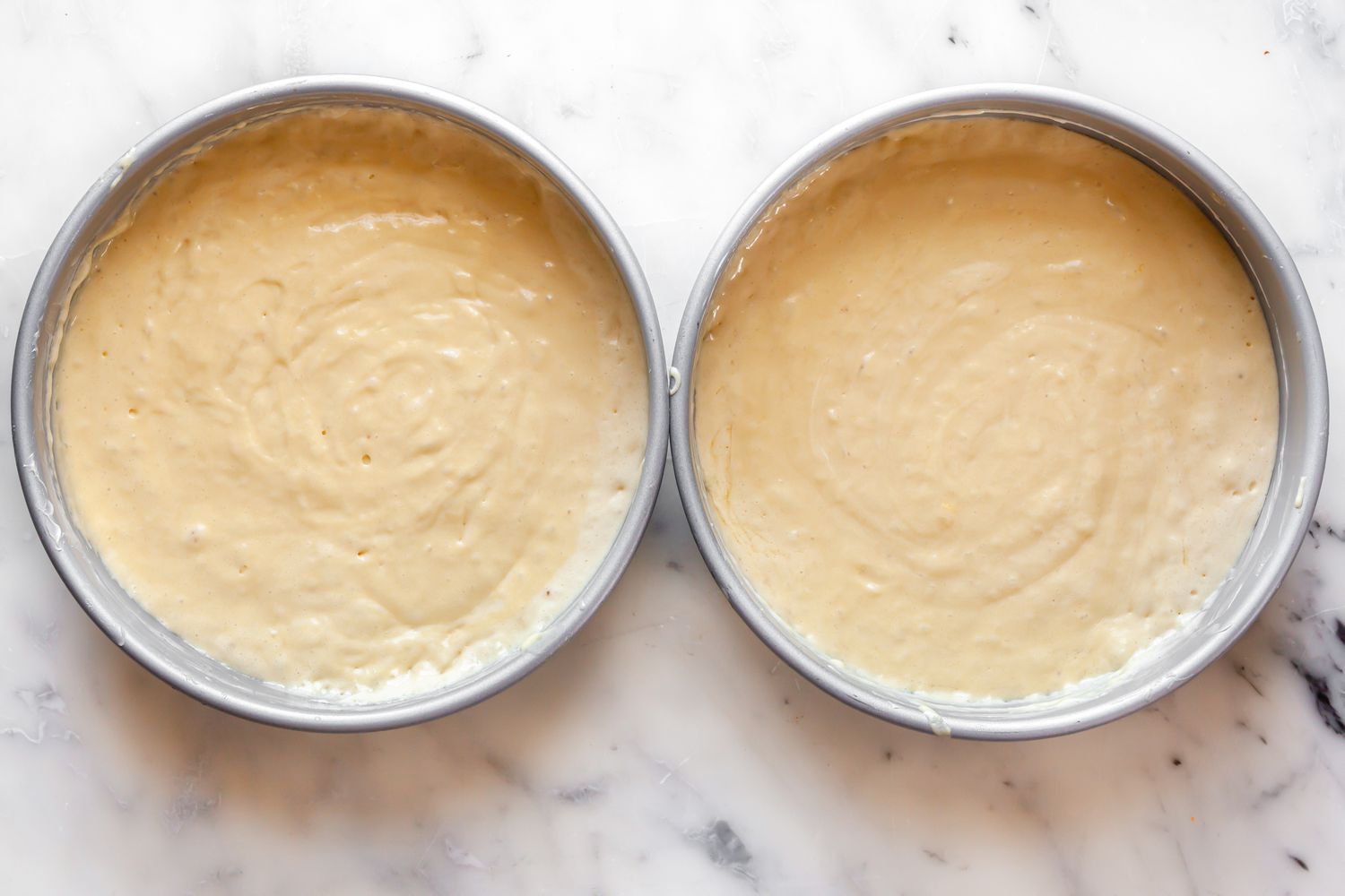 Victoria Sponge Cake Batter in Cake Pans 