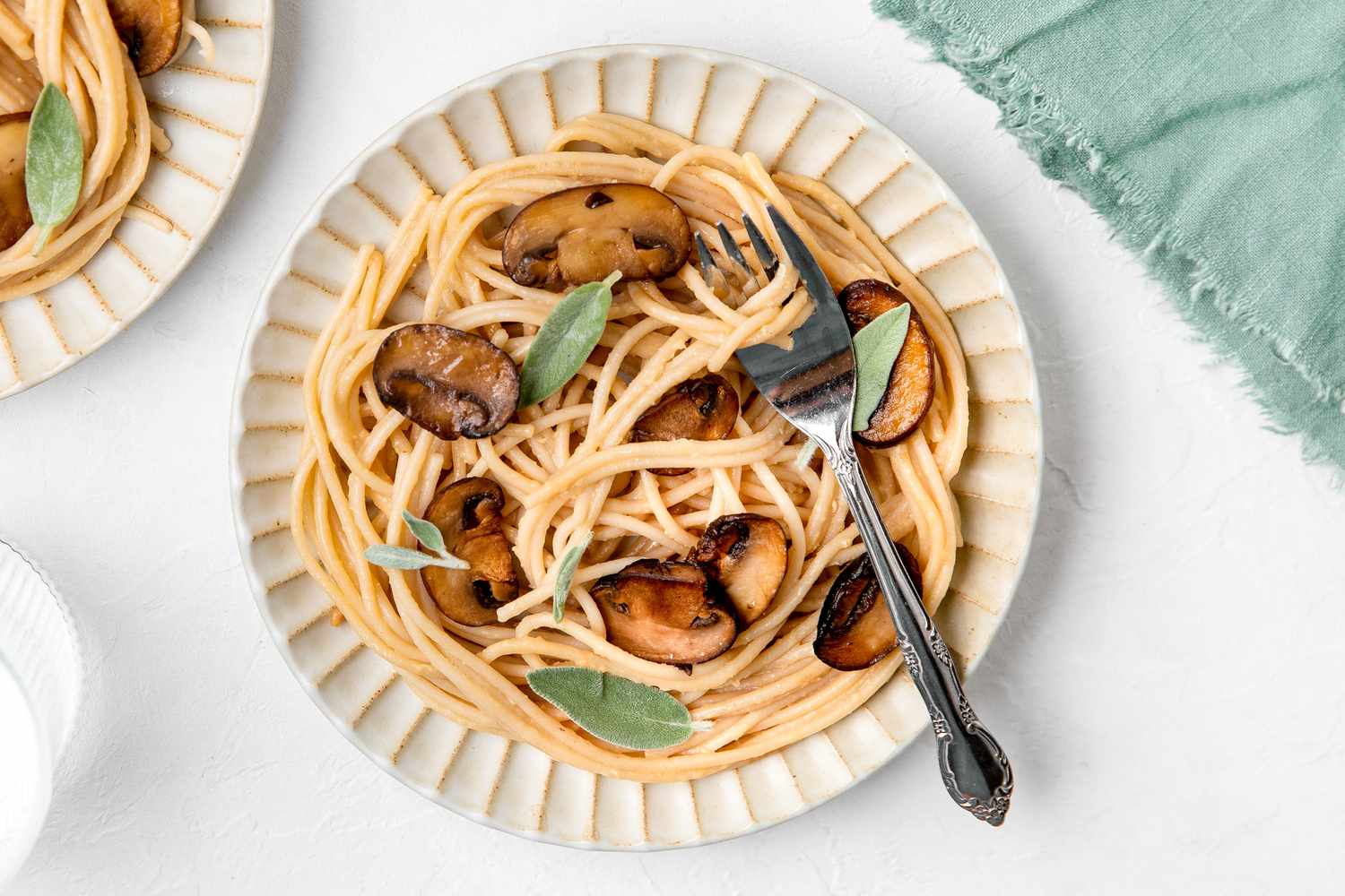Creamy Miso Mushroom Pasta on a Plate with a Fork
