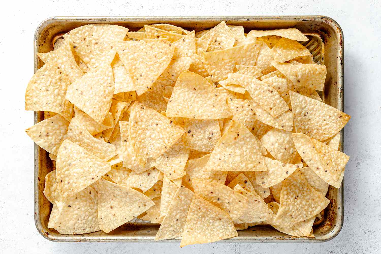 Tortilla Chips on a Baking Tray for Vegan Nachos Recipe
