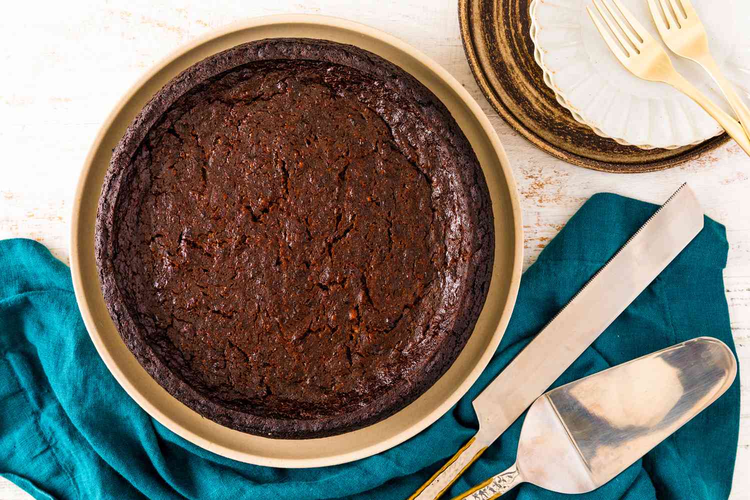 overhead view of baked Jamaican Black Cake on a platter