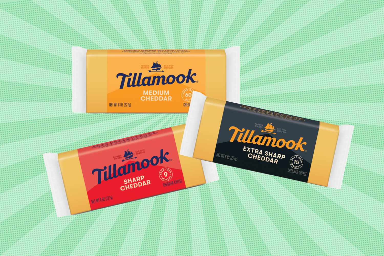 Tillamook cheese products showcasing Medium Sharp and Extra Sharp cheddar varieties on a light striped background