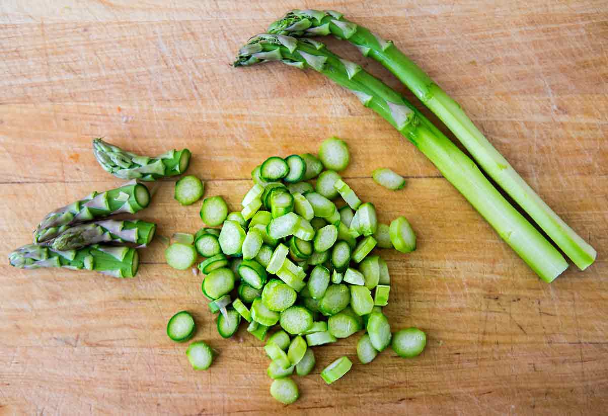 Chopped asparagus on a cutting board