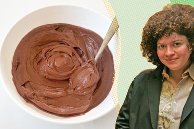 A bowl of chocolate frosting on the left a person wearing a suit on the right