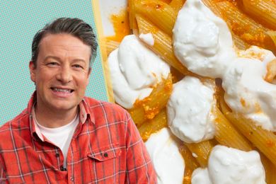 Jamie Oliver next to a dish of pasta with a creamy sauce