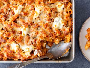 Italian Sausage Pasta Bake in a dish with a serving scooped out