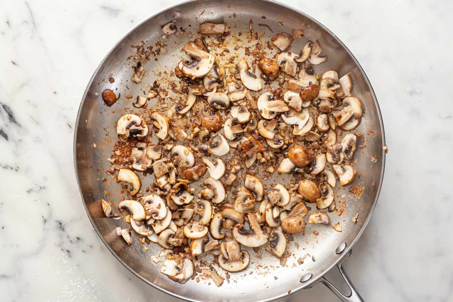 Cook shallots and mushrooms.