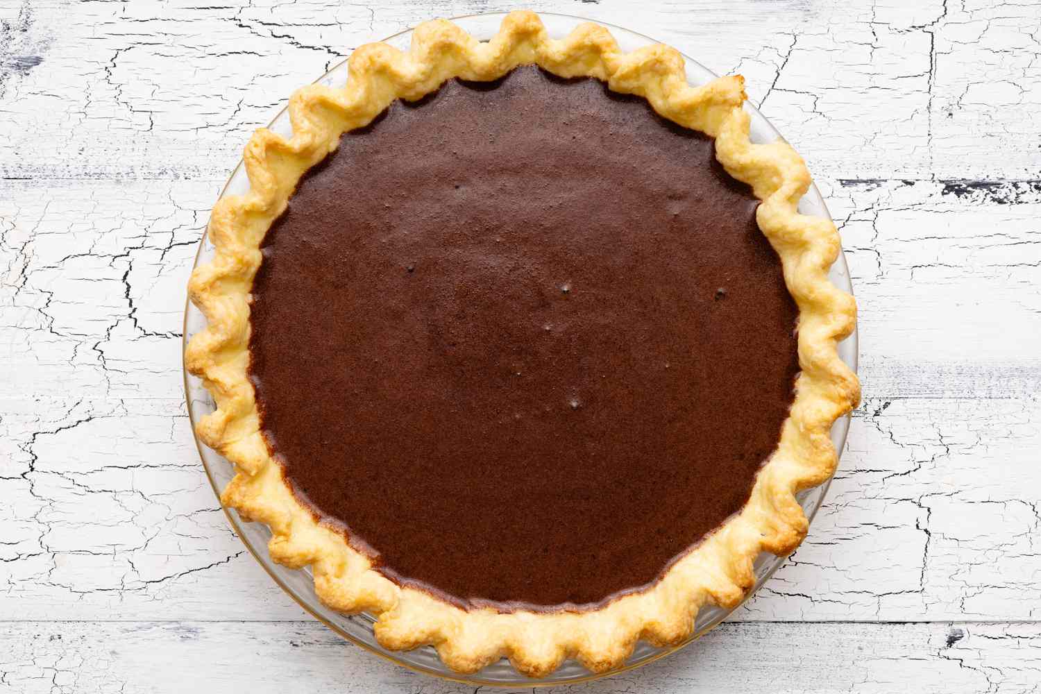 Chocolate Chess Pie Filling Added to Blind Baked Pie Shell