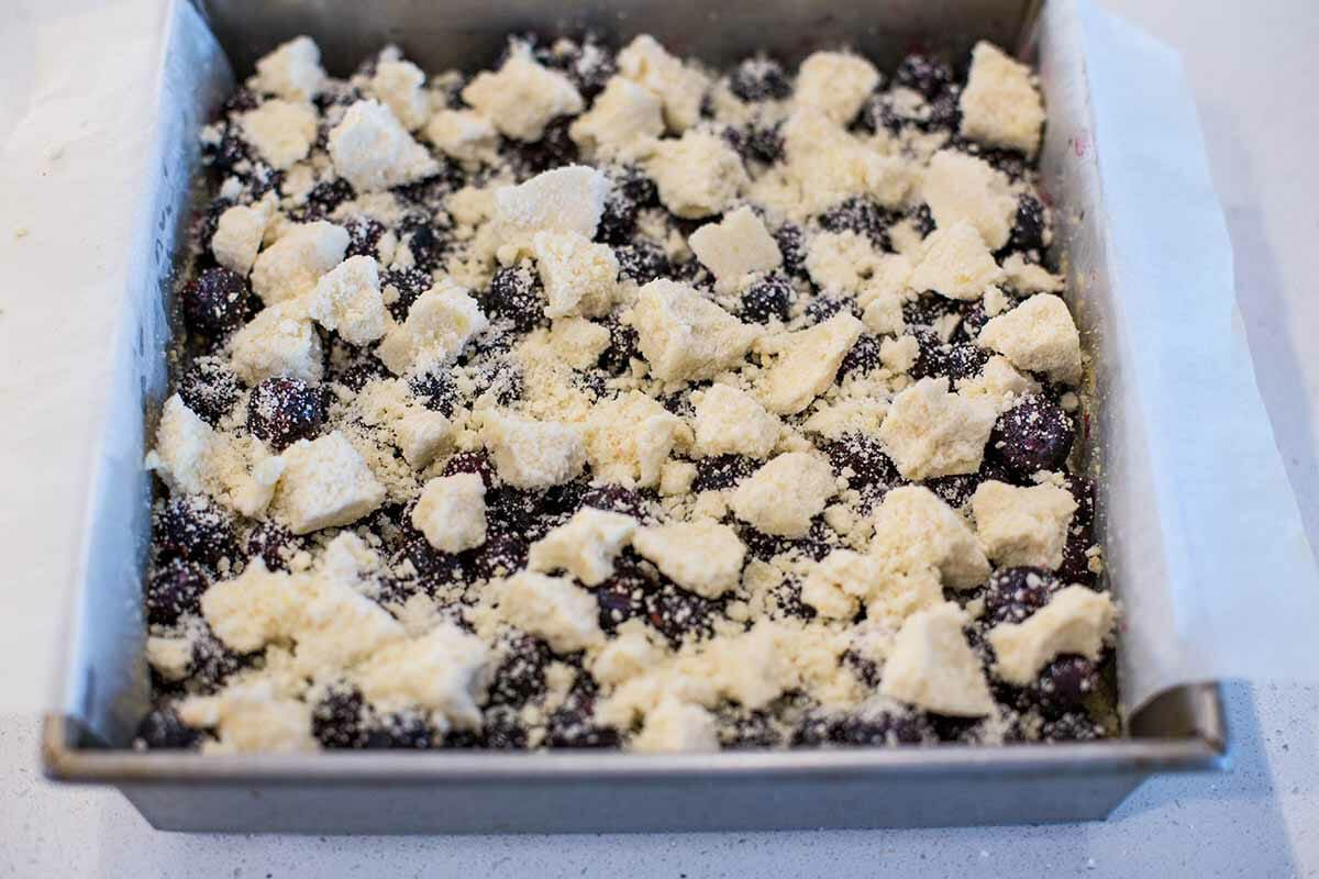Crumb Bars Recipe with Blueberries add the crust to the filling