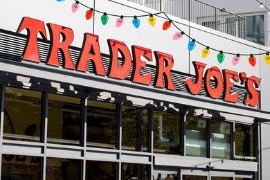Trader Joes store sign with decorative lights