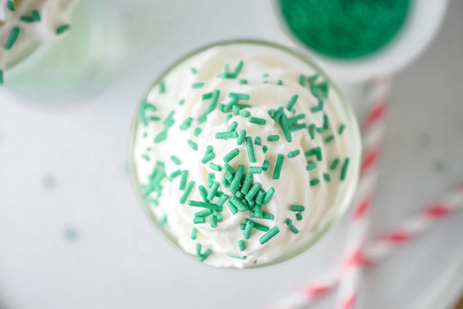 Sprinkles added to a homemade McDonald’s Shamrock Shake.