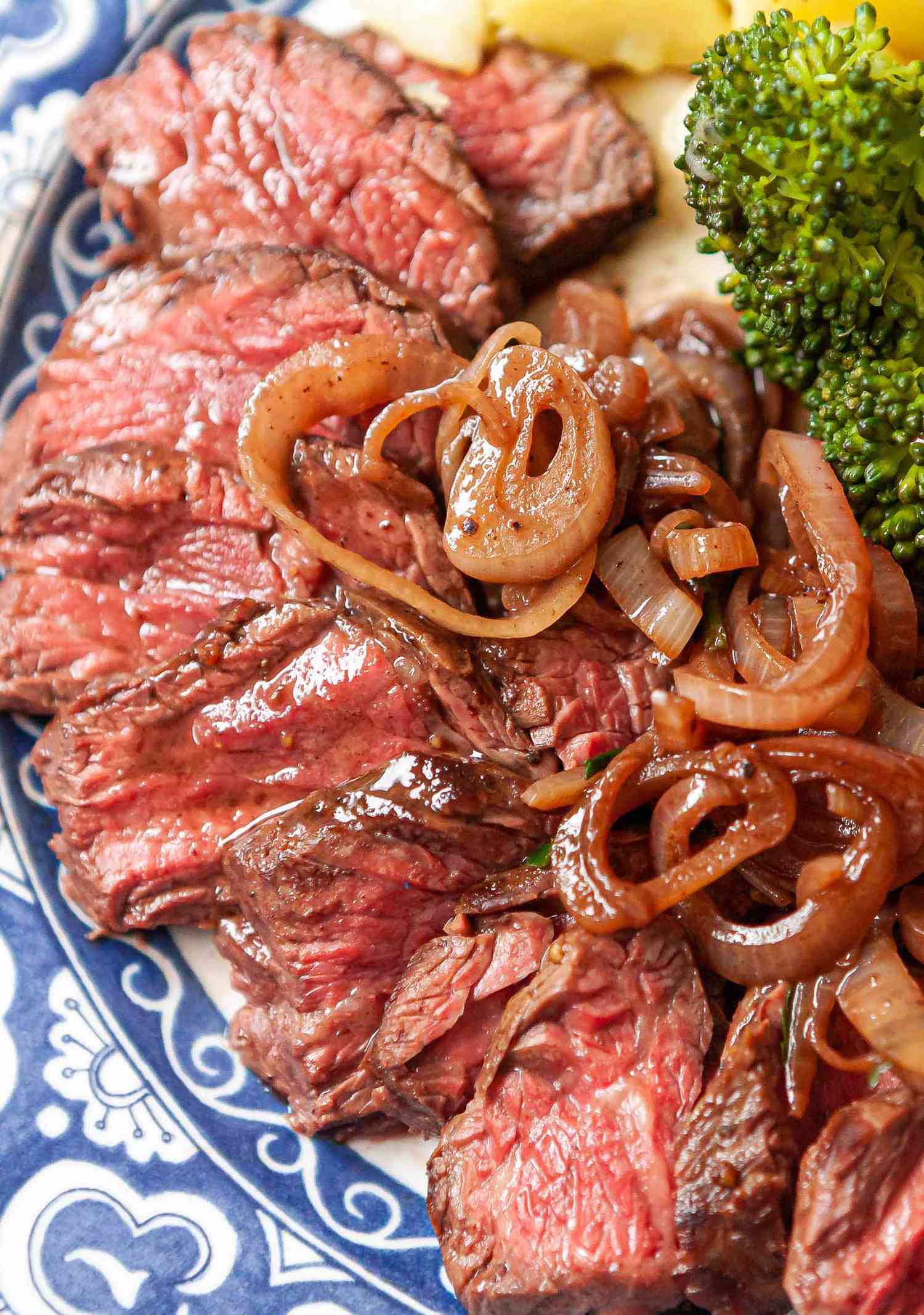 Easy stovetop hanger steak, sliced on a platter