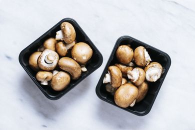 Mushrooms in black container
